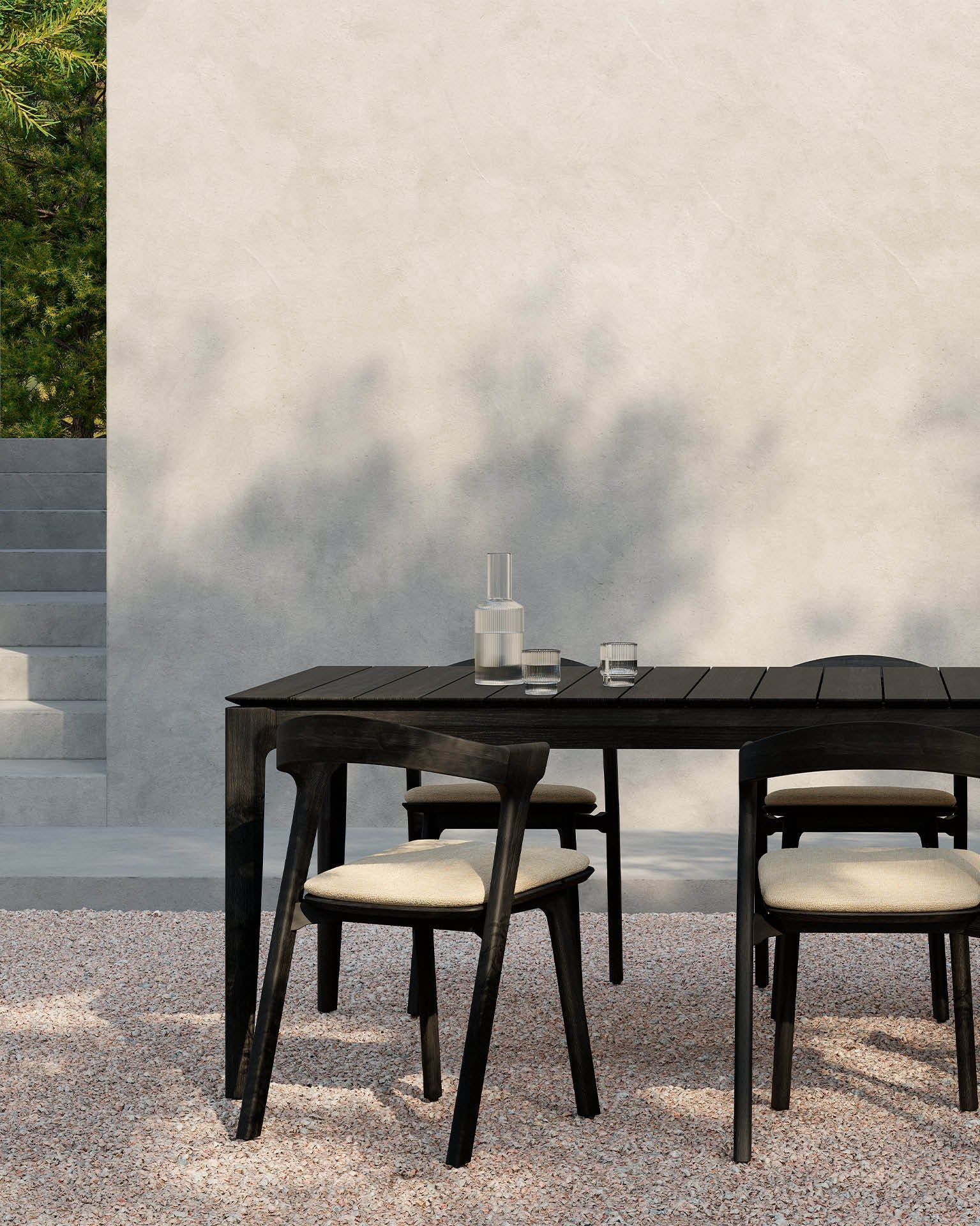 Bok Outdoor Dining Table | Varnished Teak | Black | Rectangular | 64" X 31" - Image 1