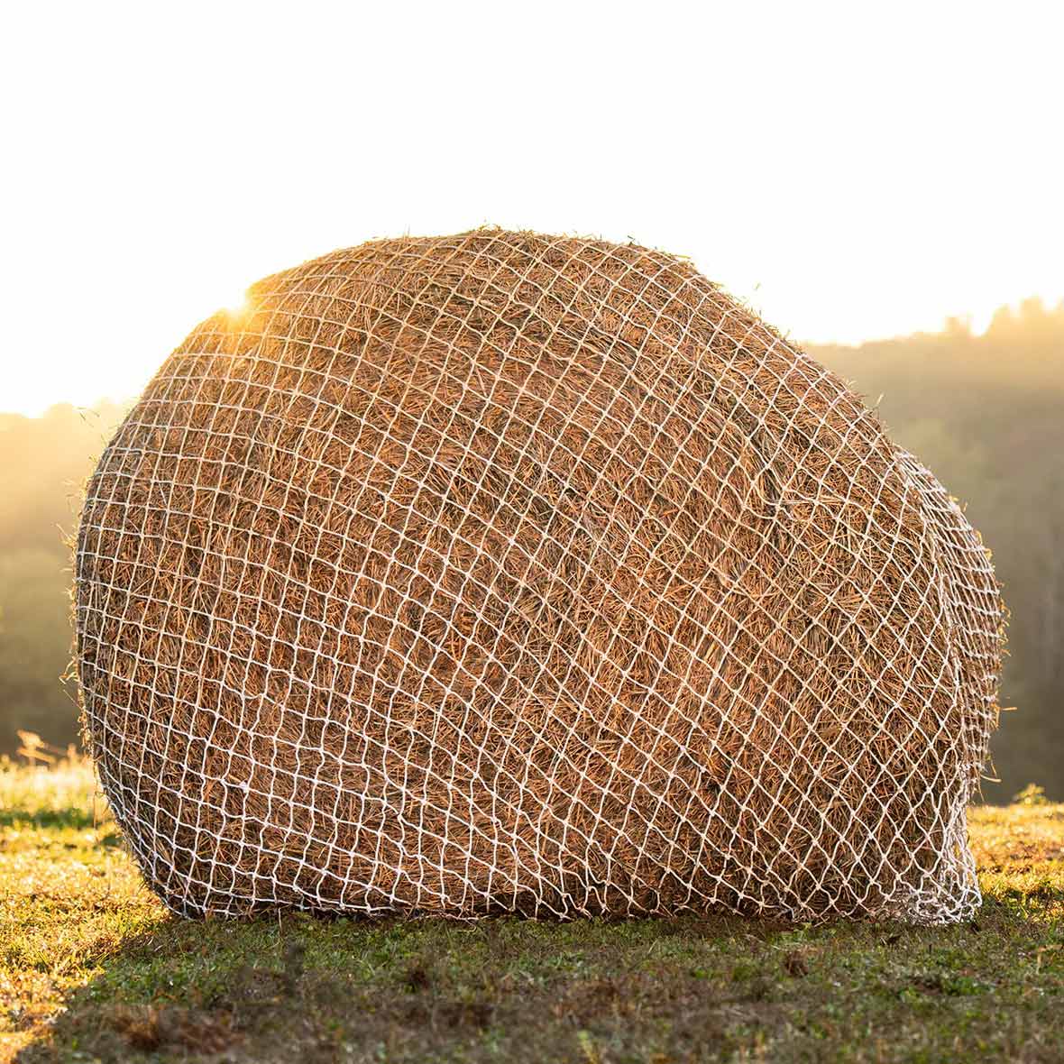 Texas HayNet Heavy Gauge Round Bale Hay Net, 2.25" Holes - Image 1