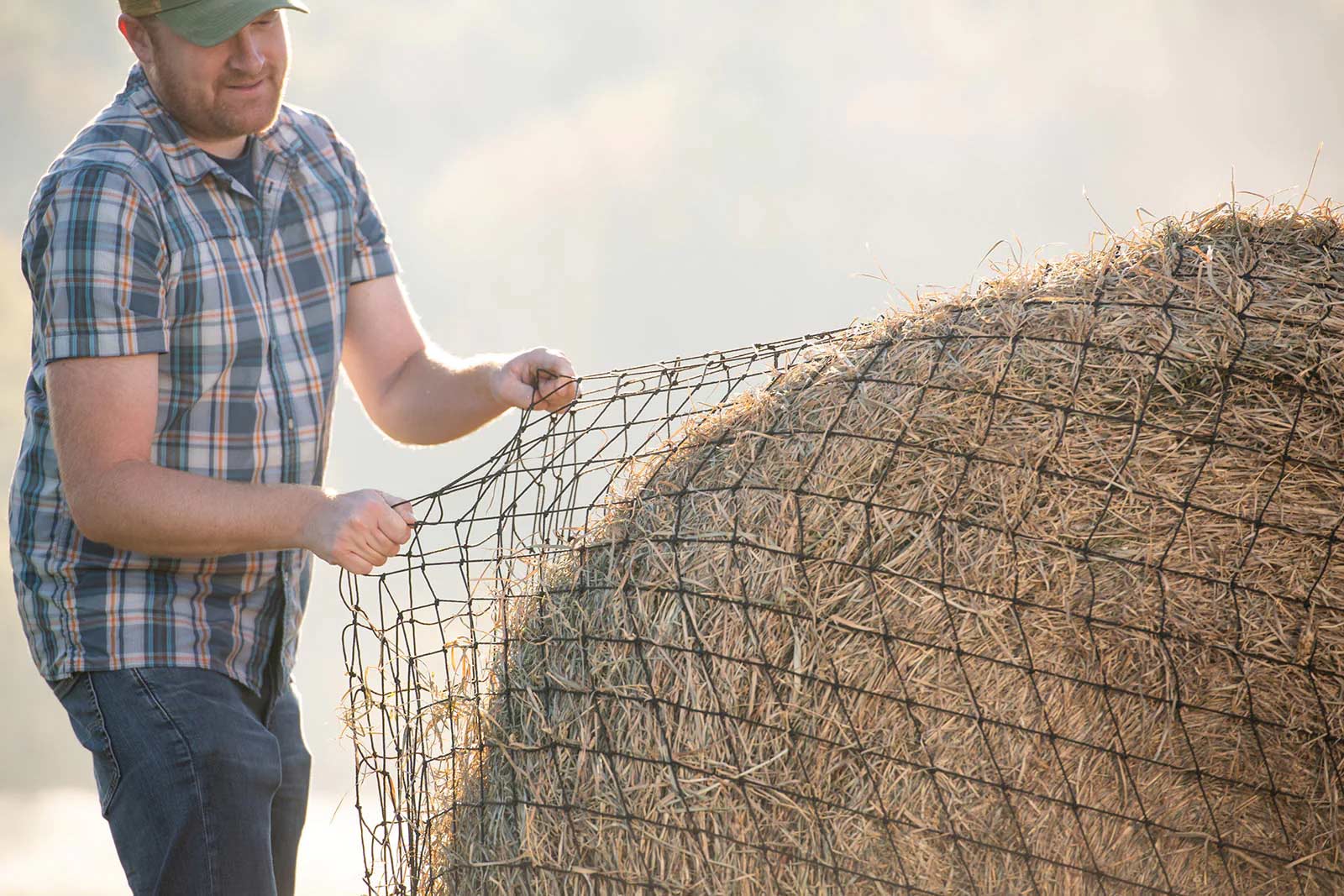 Texas Haynet Livestock Hay Bale Net for Round or Square Bales, 3" Holes - Image 1